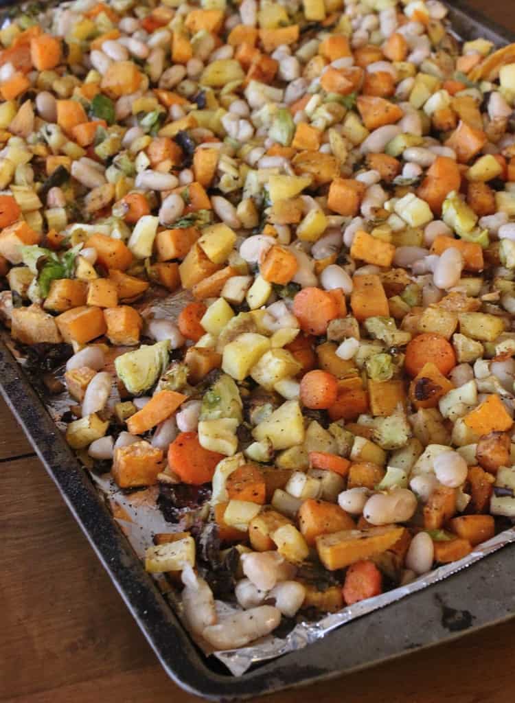 Roasted Winter Vegetables with Cannellini Beans- roasting these vegetables makes them over-the-top delicious! The veggie-hating guys in my house couldn't stop eating them!