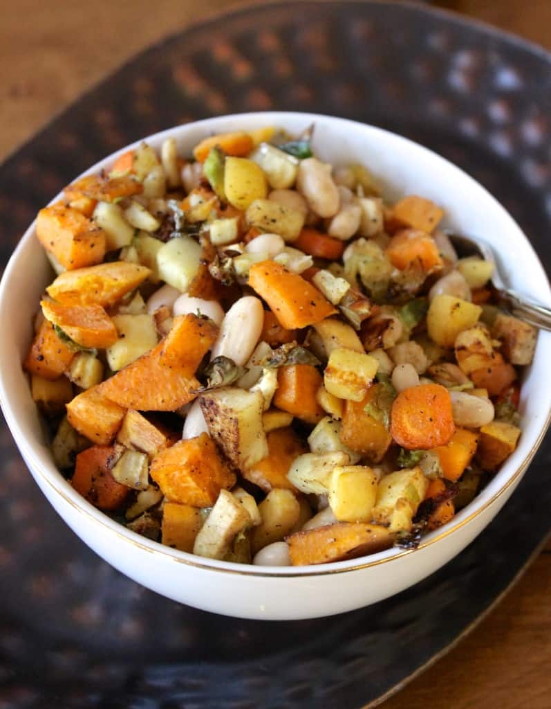 Roasted Winter Vegetables with Cannellini Beans- roasting these vegetables makes them over-the-top delicious! The veggie-hating guys in my house couldn't stop eating them!