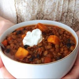 This sweet potato, black bean, and lentil chili is healthy and hearty– you'll never miss the meat! Healthy comfort food at its finest.
