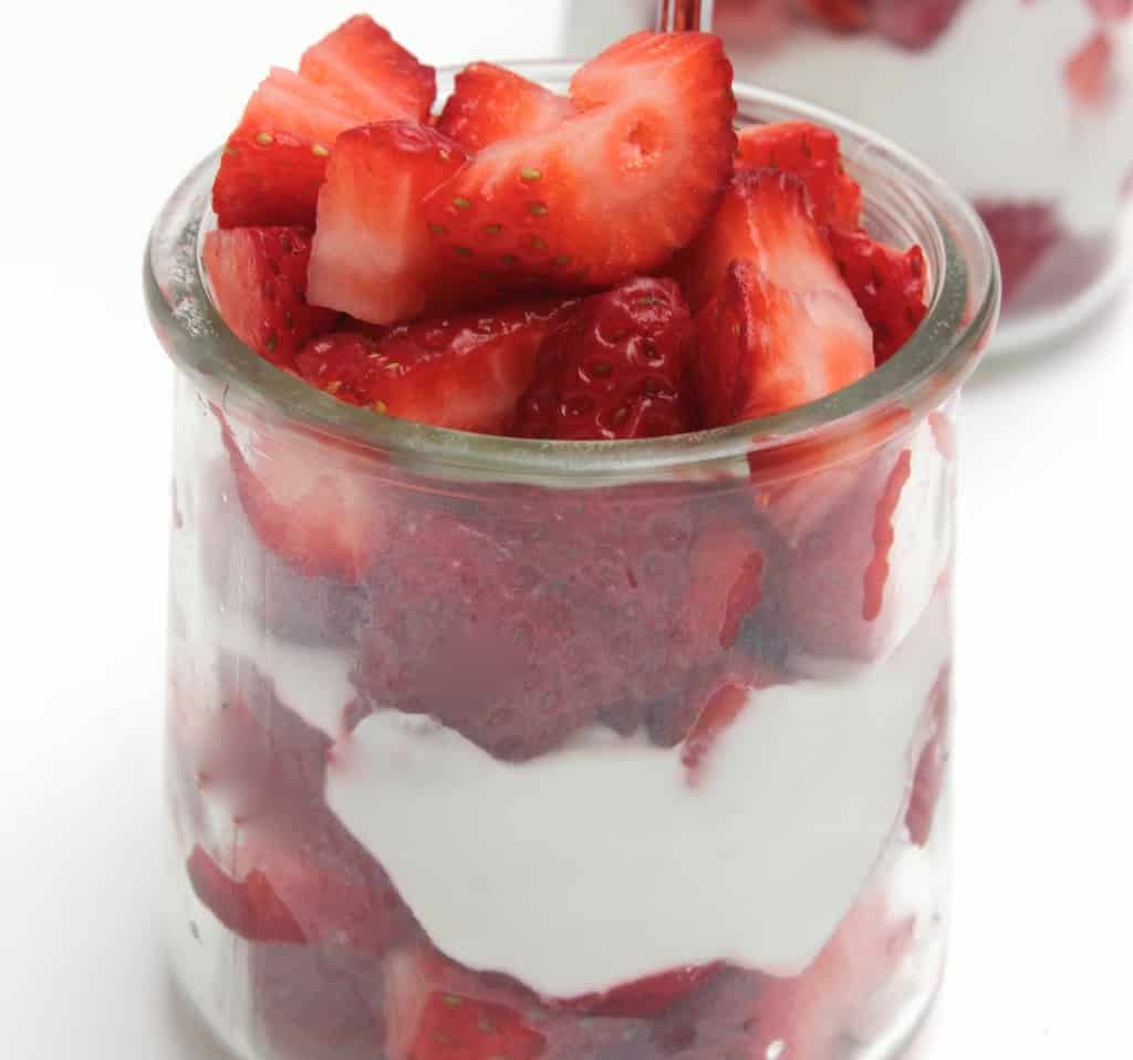 Healthy Strawberries and Cream Parfait- did you know you can whip coconut milk into cream?!