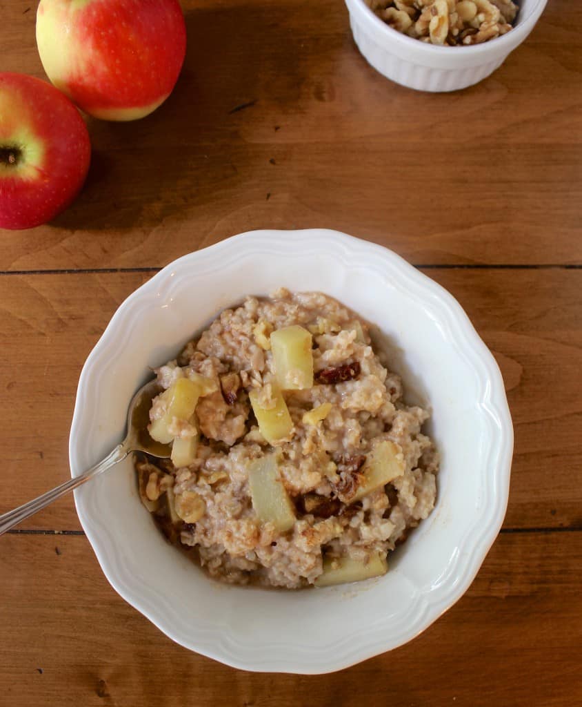 Packed with walnuts, raisins, and cinnamon, this apple pie oatmeal is healthy fall comfort food!