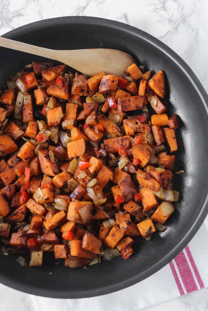 One Skillet Sweet Potatoes are crispy & a healthy side or breakfast dish! | www.healthy-liv.com