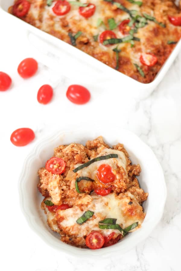 Cheesy caprese quinoa casserole with tomatoes & basil- super simple and healthy!